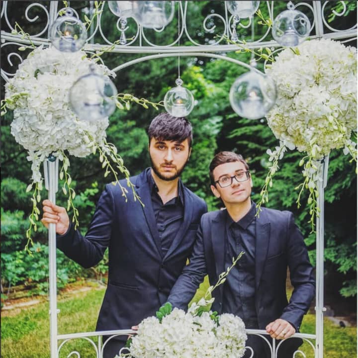 Musician Brad Walsh and fashion designer Christian Siriano hold their wedding ceremony at the summer home in Danbury.