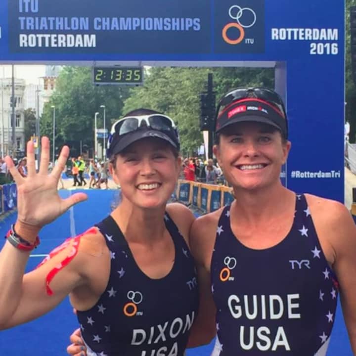 Greenwich&#x27;s Amy Dixon, left, and celebrates with guide Susanne Martineau Davis after finishing fifth Sunday at the ITU World Championships in Rotterdam.