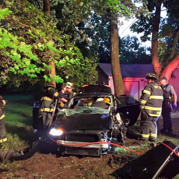 Firefighters had to remove a door and cut through the roof of the car to remove the victim.