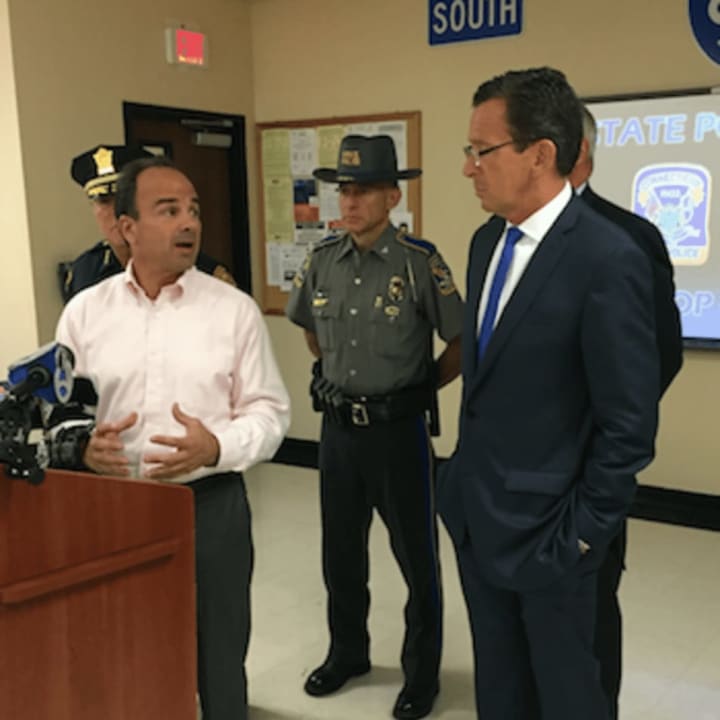 Bridgeport Mayor Joe Ganim thanks Gov. Dannel P. Malloy&#x27;s commitment to help the city reduce crime after a recent spate of shootings. They spoke at a press conference following a closed-door meeting with law enforcement officials Thursday morning.