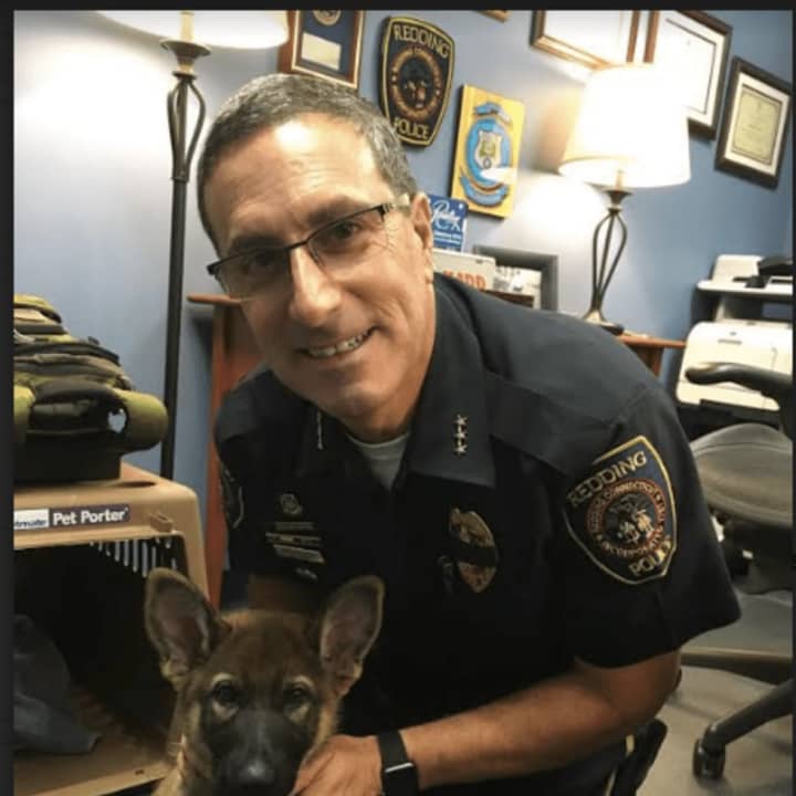 Redding Police Chief Doug Fuchs is raising a puppy, which he named Kato, to be a guide dog for the blind.
