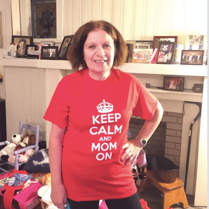 Madeline Essig wearing the Ridgefield Park Mom&#x27;s &quot;Keep Calm and Mom On&quot; shirt the group will be selling at the village street fair.