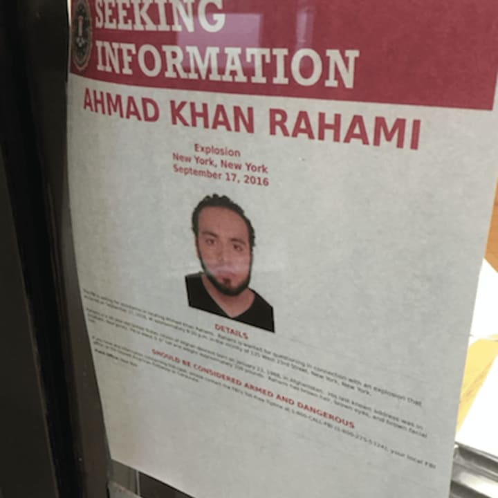 Ahmad Khan Rahami, 28, was wounded in a shootout just after he was discovered in Linden, New Jersey around 10:30 a.m. He&#x27;s a suspect in a Manhattan bombing and two other potential bombings. His image in the lobby at Stamford Police headquarters.