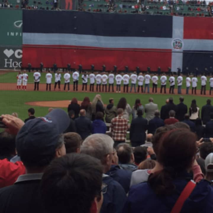Red Sox players line up as Mary J. Blige of Upper Saddle River sings at David Ortiz&#x27; final career game.