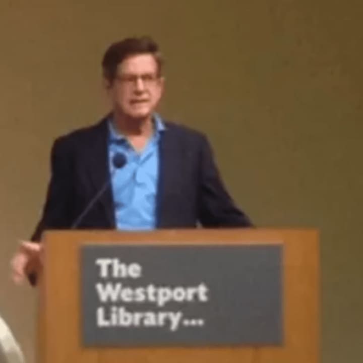 Eric Burns makes introductory remarks prior to the viewing of the third televised presidential debate between Hillary Clinton and Donald Trump at Westport Library, Oct. 19, 2016.
