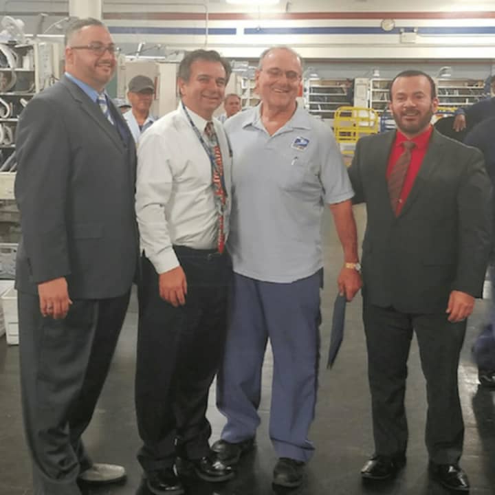 Northern New Jersey District Manager Steven Hernandez, Northern New Jersey District Post Office Operations Manager John Mateo, and Hackensack Postmaster Anthony LoPrinzi. Mr. Alcuri, a Carlstadt resident.