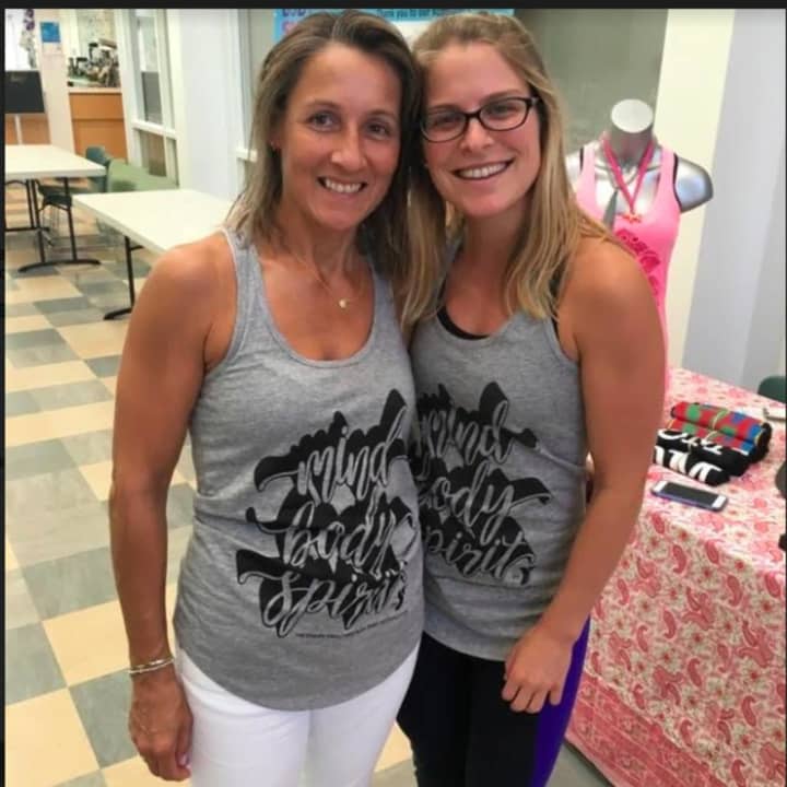 From left, Beata Keleman and Jess Van Sciver wearing tanks from Luckyyoga, one of the vendors who will be at the Holiday Boutique to benefit revive.