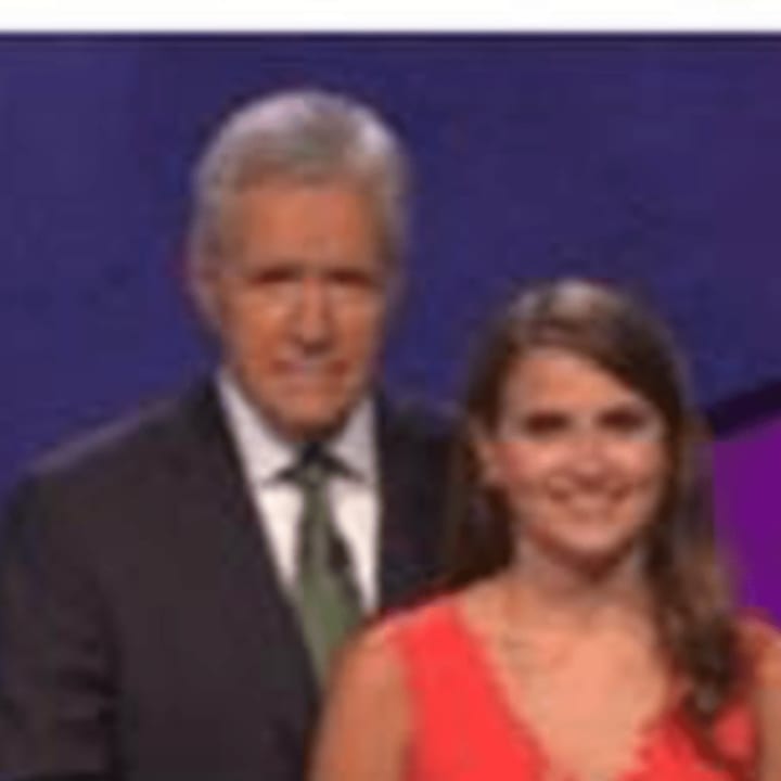 Susanna Barron, a law student from Greenwich, with &quot;Jeopardy&quot; host Alex Treback.