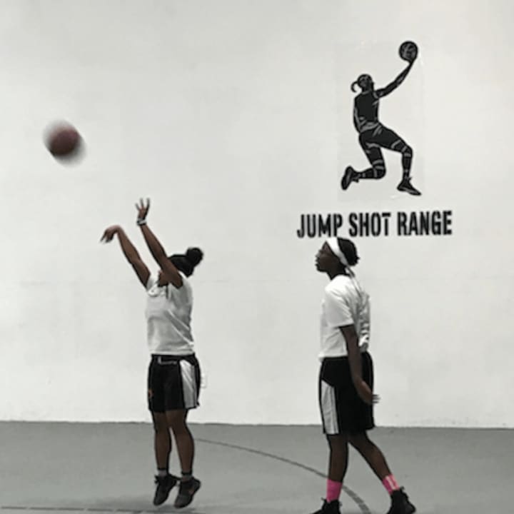Kids practice their form at Jump Shot Range.