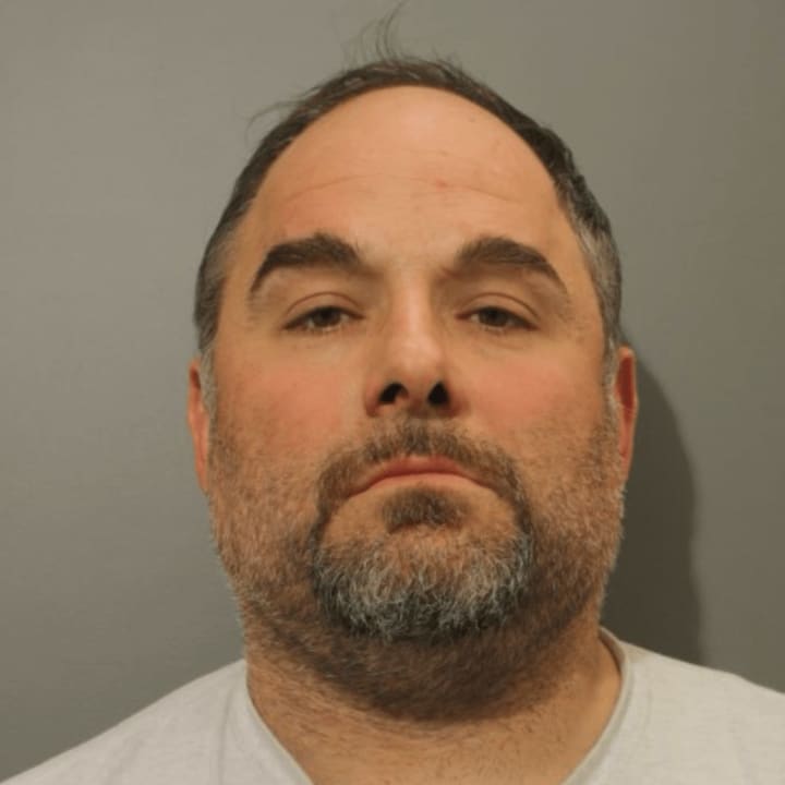 Ioannis Papakosmas is charged with offering a $1,000 bribe to a Town of Wilton official.