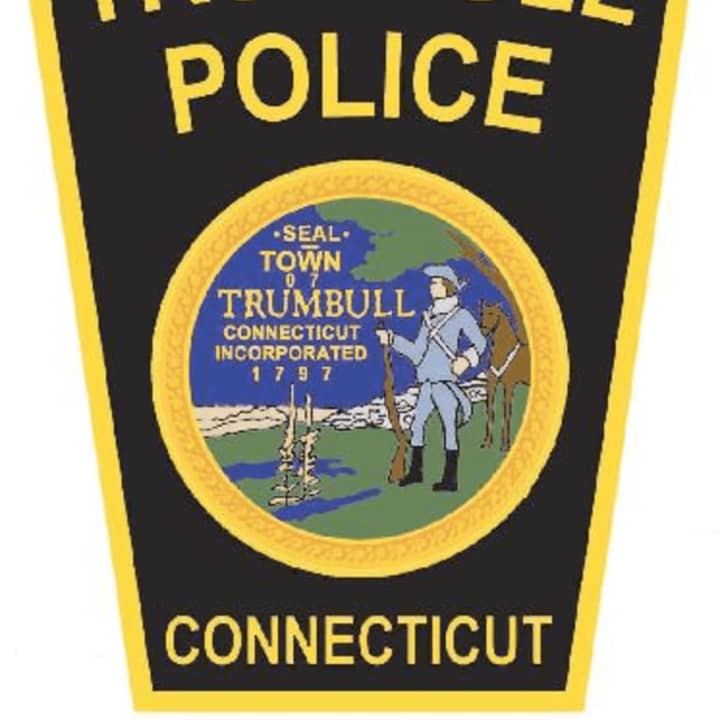 Trumbull Police said two men posing as cops robbed a jewelry salesman at gunpoint on Thursday