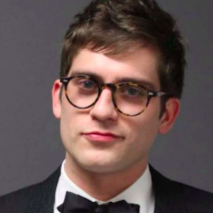 Lucian Wintrich released his police mug shot via Twitter.