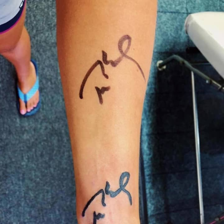 A Stratford teenager&#x27;s photo has gone viral after she got Tom Brady&#x27;s signature tattooed on her arm.