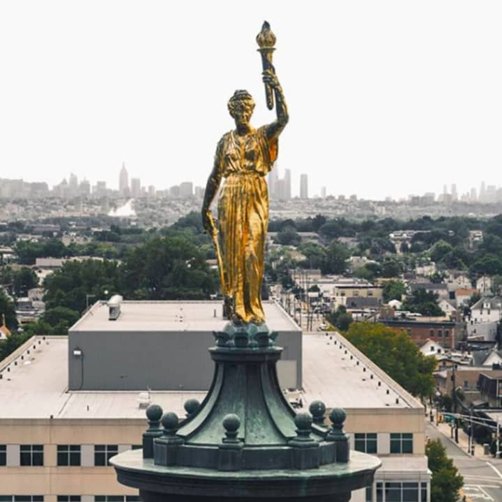An up-close drone shot of the statue atop the Bergen County Courthouse in Hackensack.