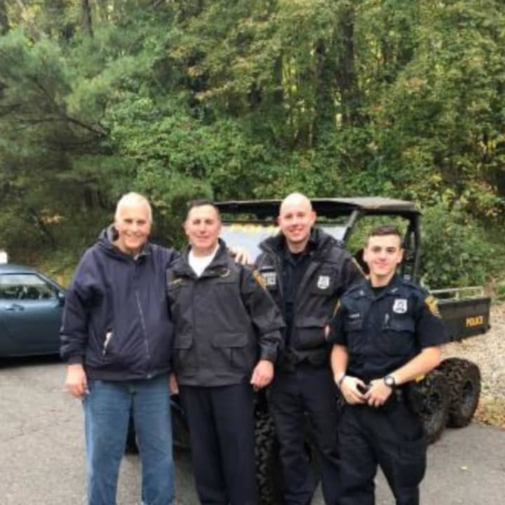 Leroy Junker with Lt. Gruppuso and police officers Henderson and Hansen.