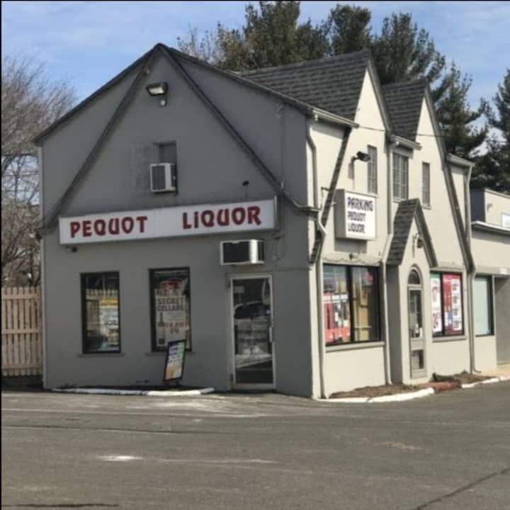 A masked, armed man robbed Pequot Liquor in Southport.