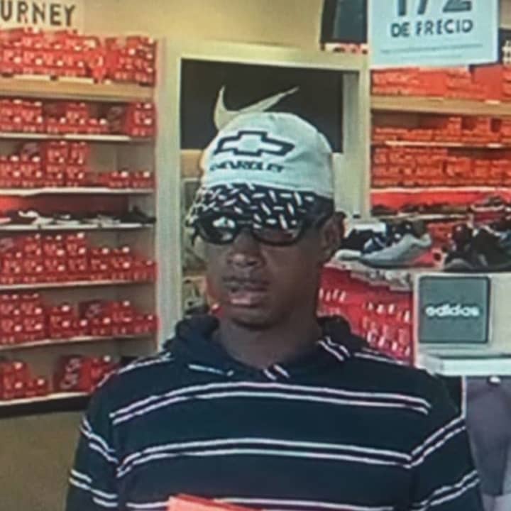 Police have released a surveillance photo of a man caught stealing sneakers from a store in Islandia.