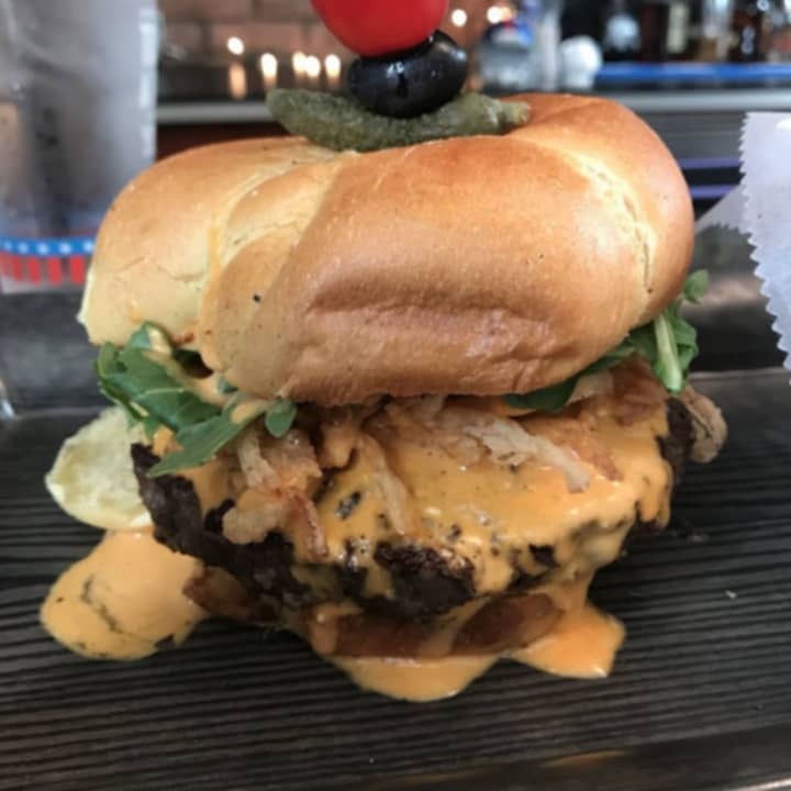 &quot;The Train Wreck&quot; (spicy blue cheese, frizzled onions and arugula on brioche) from Westchester Burger Co., which is opening a new location in Scarsdale on Monday, Oct. 7.