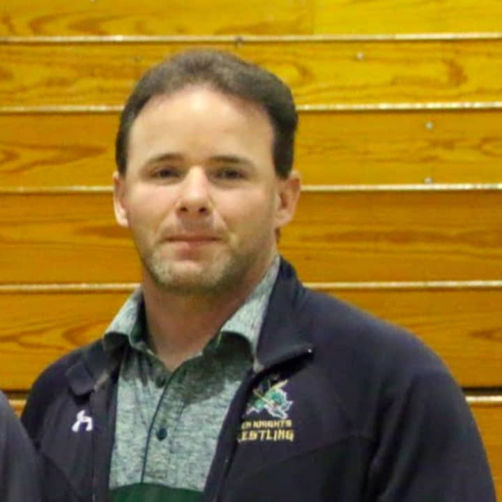 New Jersey wrestling coach and Sayreville teacher John Denuto was charged in a teenage sex assault.