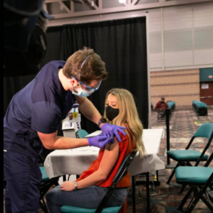 A New Jersey resident gets vaccinated at the AtlantiCare mega-site in Atlantic City.