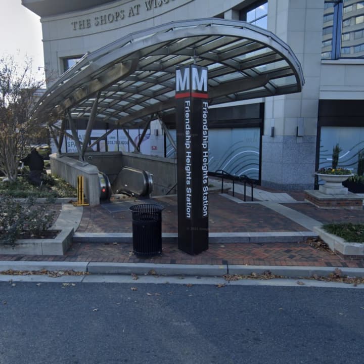 The woman was reportedly trapped under a train at the Friendship Heights station.