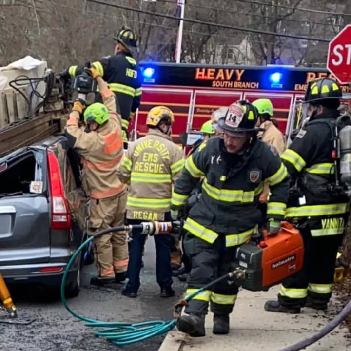 A 47-year-old driver was flown to a nearby hospital after a piece of machinery fell from a dump truck towing a well-drilling machine, impaling the roof of an SUV in Hunterdon County Thursday afternoon, authorities said.