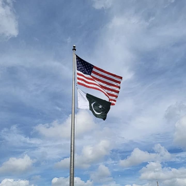 The Pakistani flag fliew with the American flag at Edison Municipal Building last summer. The mayor said other foreign flags would be flown there to reflect the diversity of the community.