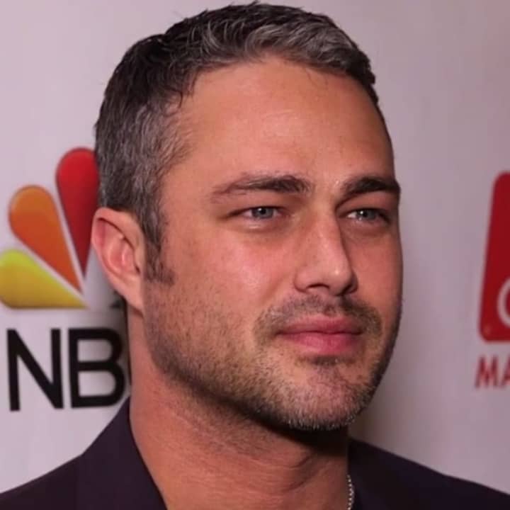 Taylor Kinney being interviewed for Behind The Velvet Rope TV on March 10, 2016.