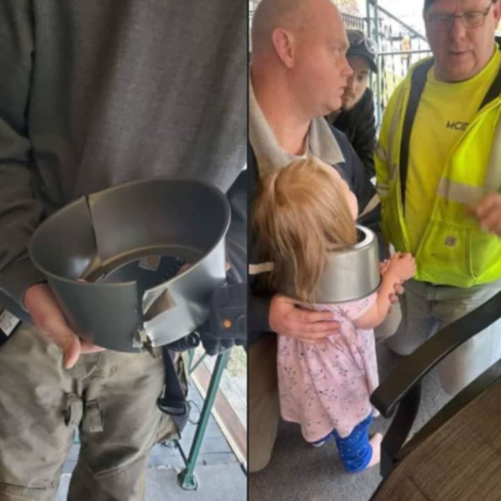 The Junction Fire Company rescue the toddler from the cake pan.