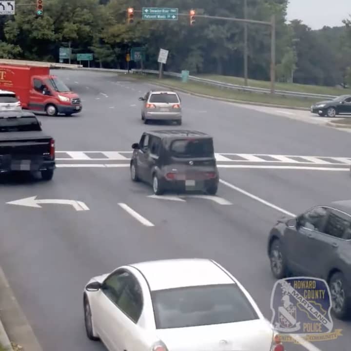 Just one example of a driver speeding through a red light in Maryland