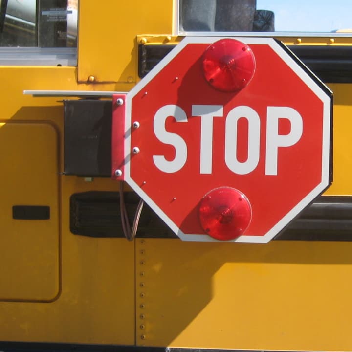An unidentified school bus monitor was hit by a bus this morning on Columbus Avenue.