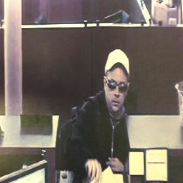 Surveillance footage of the suspect in a bank robbery that took place at the Chase Bank on Main Street in Westport Thursday morning.