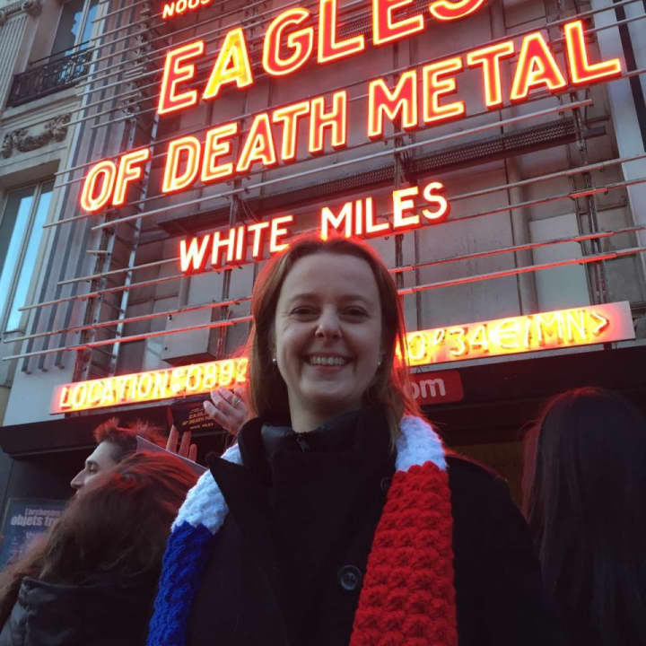 Theresa Cede wore the scarf in the colors of the France flag made by Karen Mello of Bethel to a concert by Eagles of Death Metal in February.