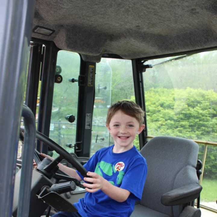 A student at Pocantico Hills School gets behind the wheel of a big rig for &quot;Truck Day.&quot;