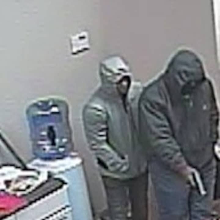 Police are seeking two men who are accused of stealing $20,000 worth of smart phones and iPads from a local Verizon store.