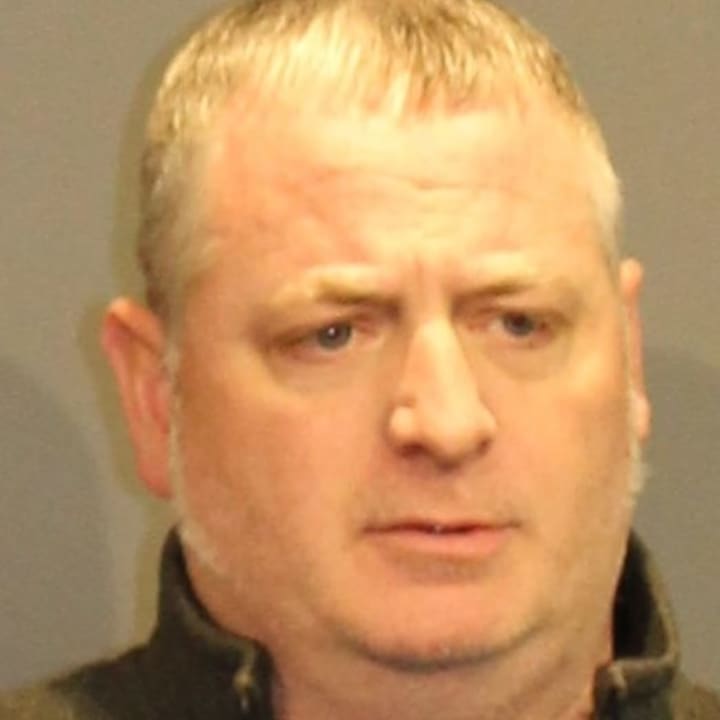 Danbury Police Officer David Williams was charged with breach of peace.