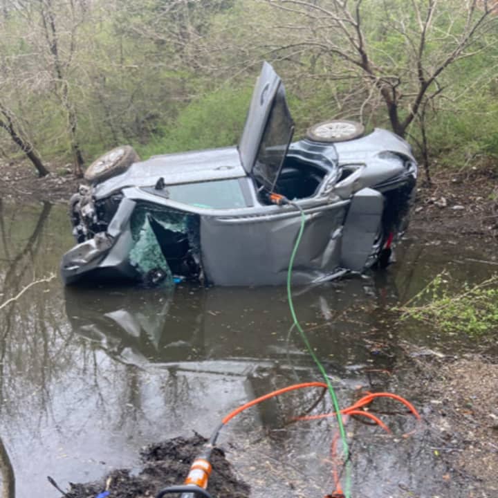 A 52-year-old Long Island man suffered fractures to both legs and hypothermia after crashing into a pond.