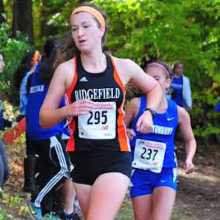 Carey Depuy runs for the Ridgefield High School cross country team at a race last year. The 2015 graduate died in a plane crash Sunday in New York. 