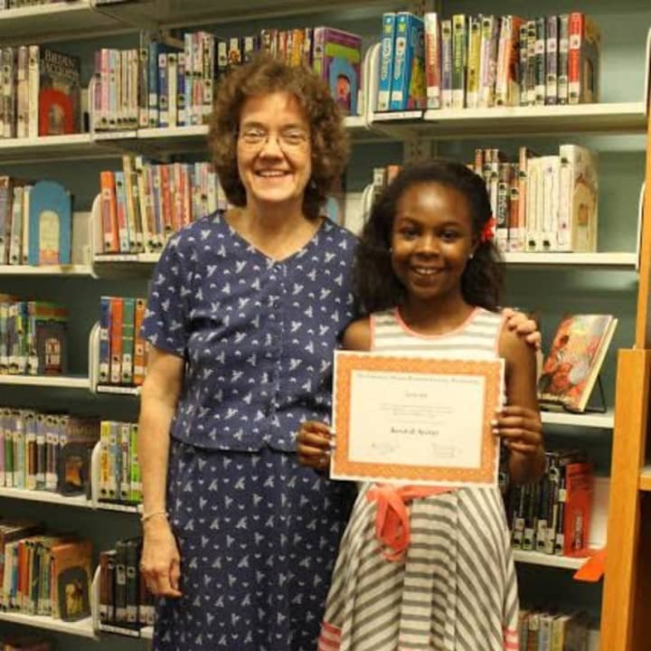 Chapel School student Kendall Archer was awarded the Librarian Sharon Peterson Literacy Scholarship named for school librarian Sharon Peterson Finster (Osenberg) who is retiring this summer.