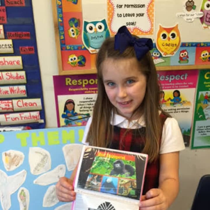 Katie, a second-grader at the Chapel School in Bronxville, sold cookies and lemonade to raise money to buy books on endangered animals for the school&#x27;s library.