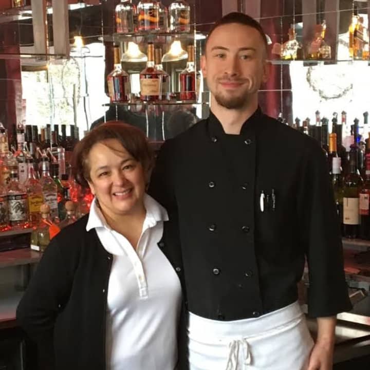 Sandra Parra-Flores, left, with Executive Chef Luke Charof, owns Copas Restaurant in Bethel with her husband, Carlos. The restaurant celebrates its one-year anniversary in January.