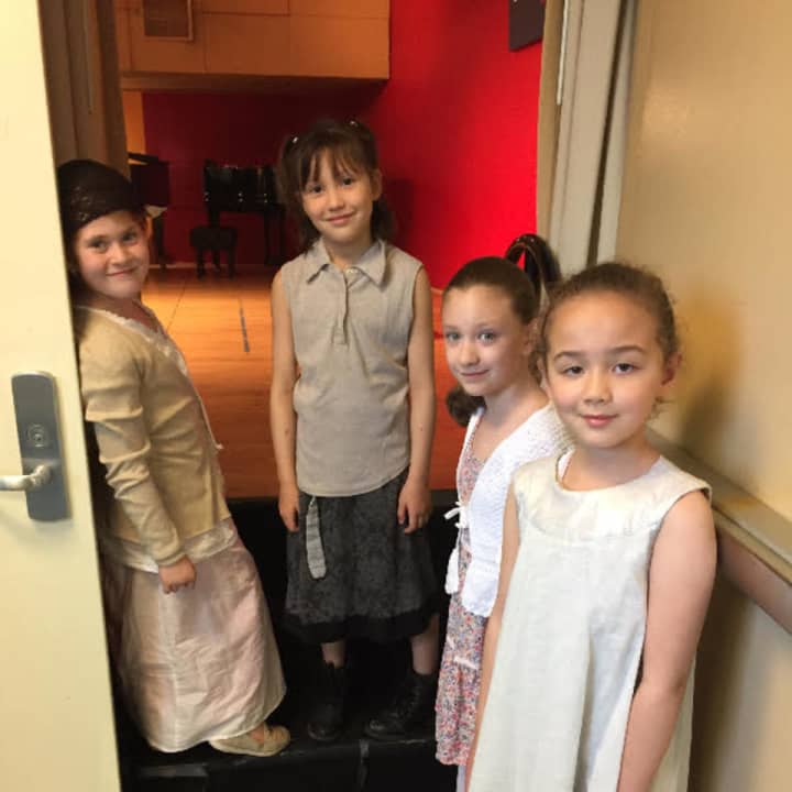 Pictured are the four girls from the Cortlandt School of Performing Arts who sang in the children&#x27;s chorus for the Taconic Opera&#x27;s production of Georges Bizet&#x27;s &quot;Carmen&quot; in White Plains.
