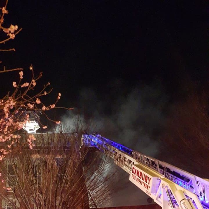 The Danbury Fire Department knocks down a blaze in a building at 276 Main St. on Christmas night. 
