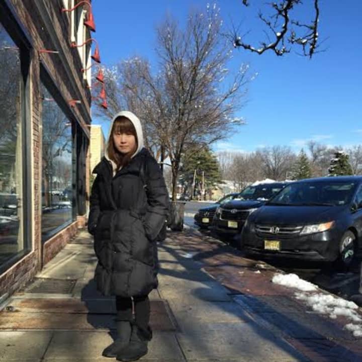 Min Hee Choi of Leonia left her house this morning thinking she&#x27;d need all-day protection from the snow.