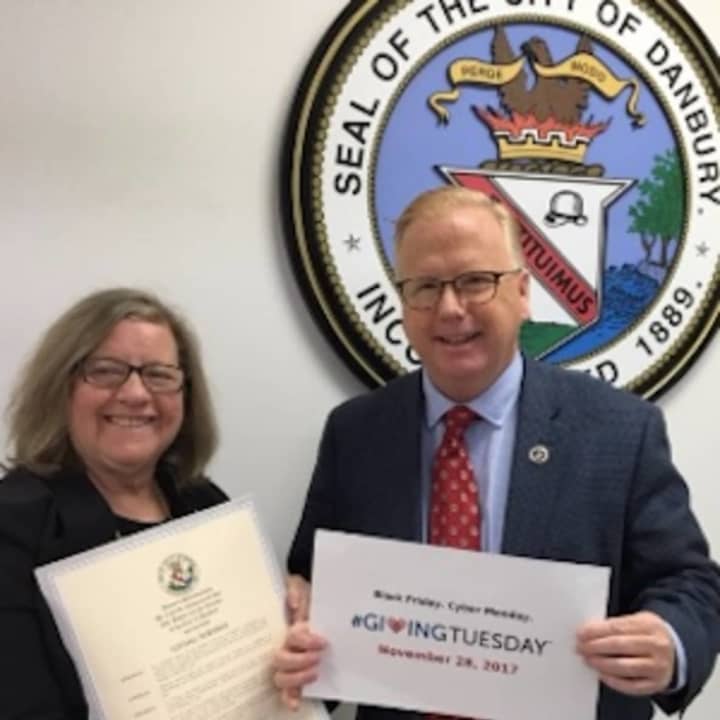 Danbury Mayor Mark Boughton with Housatonic Habitat for Humanity Executive Director Fran Normann who receives the City’s Proclamation declaring Tuesday, Nov. 28 as #GivingTuesday in greater Danbury.