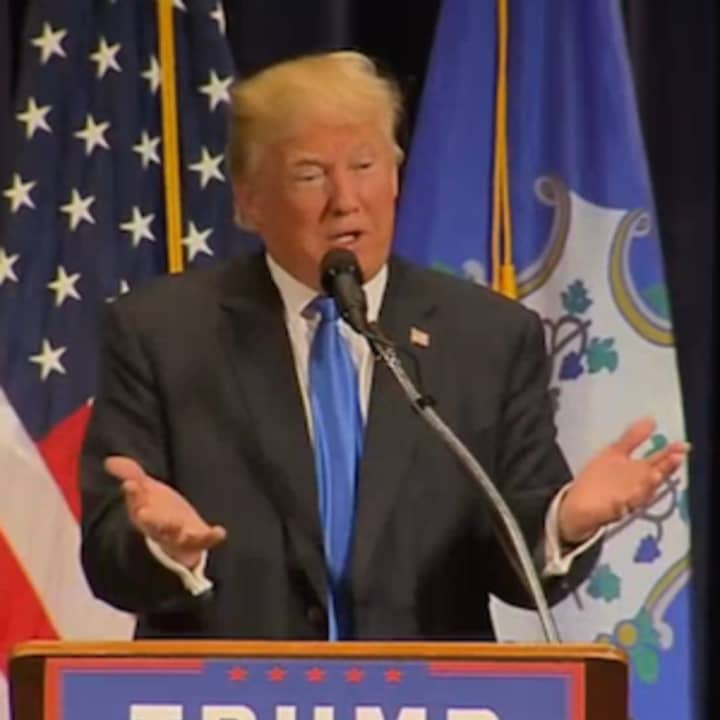 Republican presidential candidate Donald Trump at the podium at a Bridgeport rally.