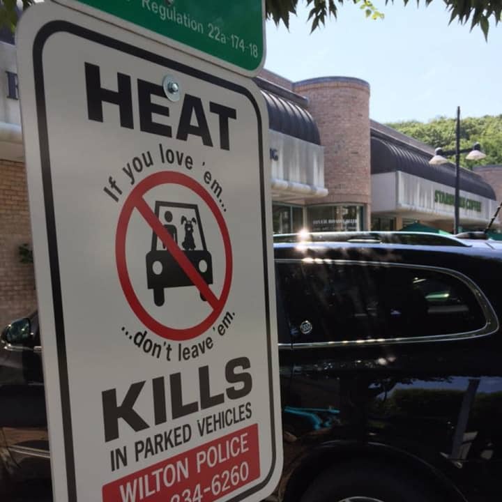 A sign initiative has been started in Wilton to discourage people from leaving children and pets in hot cars.