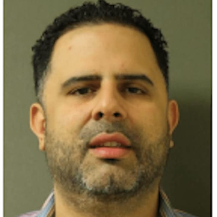 Angel Henriquez, the owner of several taxi companies, was charged with grand larceny for falsely filing for social benefits.