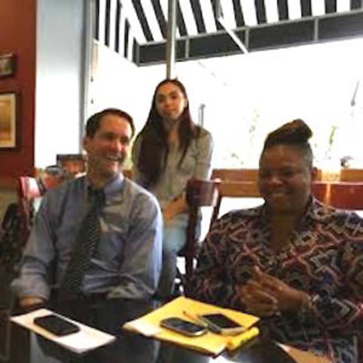 U.S. Rep. Jim Himes meets with voters at the Funchal Cafe in Bridgeport.