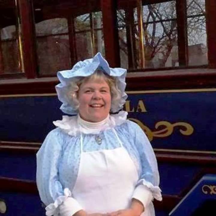 Mrs. Ann Miller, a colonial re-enactor who accompanies each trolley tour.